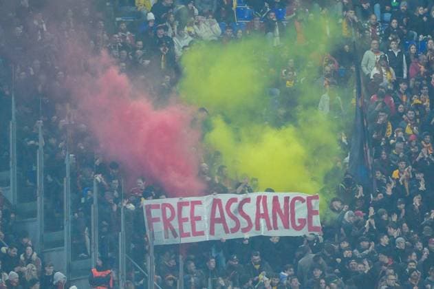 Banner for Assange during the UEFA Europa League 2023-2024 football match between AS Roma and Feyenoord at the Olympic Stadium in Rome on February 22, 2024.  Copyright: xFabrizioxCorradetti IPAxSportx x xx IPA_43661093 IPA_Agency_IPA43661093