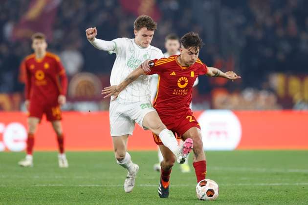 Mats Wieffer (Feyenoord) and Paulo Dybala (AS Roma) battle for the ball, UEFA Europa League 2023 24 - Knockout Round Play-offs Second Leg, AS Roma vs Feyenoord, Olimpico Stadium, February 22, 2024, Rome, Italy.