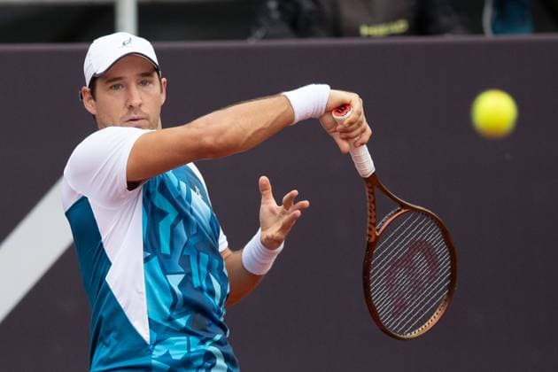 (240223) -- RIO DE JANEIRO, Feb. 23, 2024 -- Dusan Lajovic of Serbia hits a return during the round 16 match against Laslo Djere of Serbia at the 2024 ATP500 Rio Open at Jockey Club Brasileiro in Rio de Janeiro, Brazil, Feb. 22, 2024. ) (SP)BRAZIL-RIO DE JANEIRO-TENNIS-ATP500-RIO OPEN WangxTiancong 