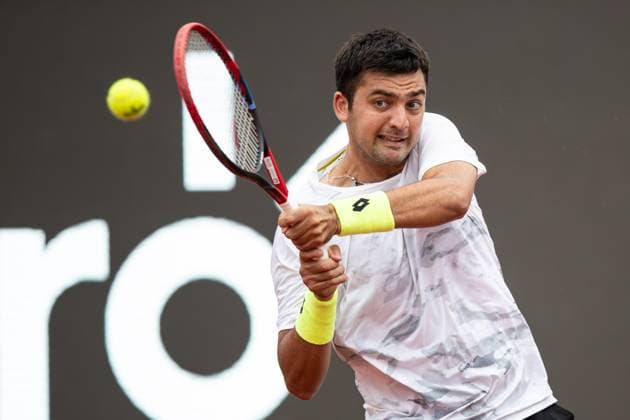 (240223) -- RIO DE JANEIRO, Feb. 23, 2024 -- Marcelo Tomas Barrios Vera of Chile hits a return during the round 16 match against Cameron Norrie of Britain at the 2024 ATP500 Rio Open at Jockey Club Brasileiro in Rio de Janeiro, Brazil, Feb. 22, 2024. ) (SP)BRAZIL-RIO DE JANEIRO-TENNIS-ATP500-RIO OPEN WangxTiancong 