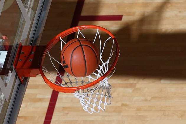 BLOOMINGTON, IN - FEBRUARY 22: A basketball with an Adidas logo goes in the basket as the Iowa Hawkeyes play against the Indiana Hoosiers on February 22, 2024 at Simon Skjodt in Bloomington, Indiana (Photo by Brian Spurlock Icon Sportswire) COLLEGE BASKETBALL: FEB 22 Women s - Iowa at Indiana EDITORIAL USE ONLY Icon24022271