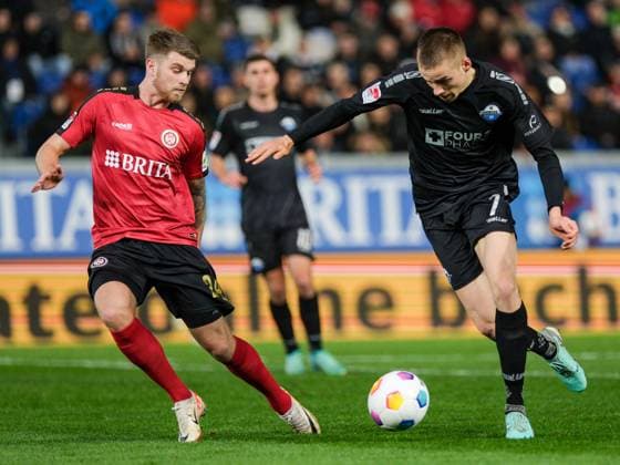 Martin Angha SV Wehen Wiesbaden, 2 in duel with Filip Bilbija SC Paderborn 07, 07 , GER, SV Wehen Wiesbaden vs SC Paderborn 07, Soccer, 2 Bundesliga, Matchday 23, Season 2023 2024, 23 02 2024 DFL REGULATES PROHIBIT ANY USE OF PHOTOGRAPHS AS IMAGE SEQUENCES AND OR QUASI VIDEO GER, SV Wehen Wiesbaden vs SC Paderborn 07, Football, 2 Bundesliga, Matchday 23, Season 2023 2024, 23 02 2024 Wiesbaden Copyright: xEibner-Pressefoto FlorianxWieganx EP_FWD