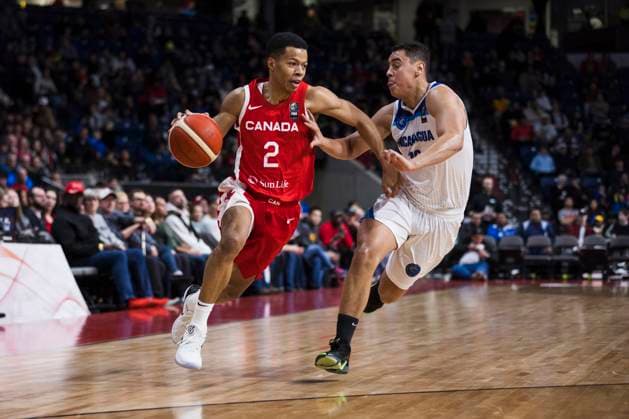 February 23, 2024, St. Catharines, On, Canada: Canada s Trae Bell-Hayes (2) tries to get around Farell Pauth (16) of Nicaragua during first half FIBA AmeriCup qualification play in St. Catharines, Ont., Friday, February 23, 2024. Canada News - February 23, 2024  - ZUMAc35_ 20240223_zaf_c35_148 Copyright: xNickxIwanyshynx