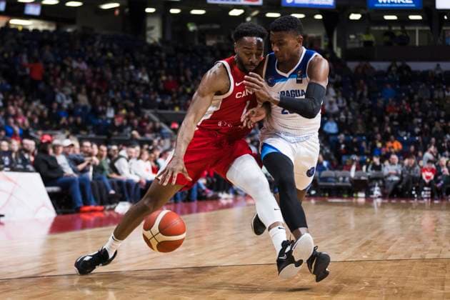 February 23, 2024, St. Catharines, On, Canada: Canada s Aaron Best (1) moves the ball past Troy Andrews (28) of Nicaragua during first half FIBA AmeriCup qualification play in St. Catharines, Ont., Friday, February 23, 2024. Canada News - February 23, 2024  - ZUMAc35_ 20240223_zaf_c35_150 Copyright: xNickxIwanyshynx