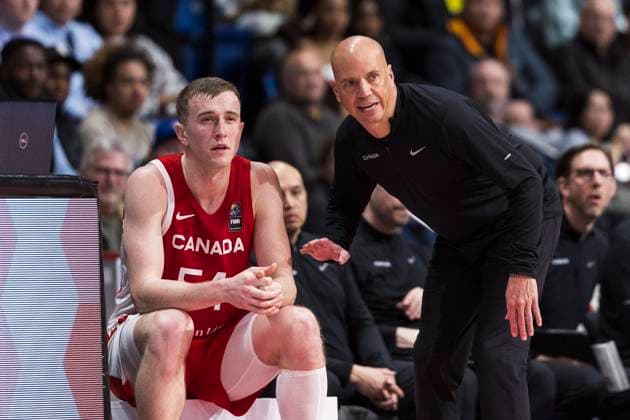 February 23, 2024, St. Catharines, On, Canada: Team Canada associate head coach Nate Bjorkgren speaks to Thomas Kennedy (54) during FIBA AmeriCup qualification play against Nicaragua in St. Catharines, Ont., Friday, February 23, 2024. Canada News - February 23, 2024  - ZUMAc35_ 20240223_zaf_c35_169 Copyright: xNickxIwanyshynx
