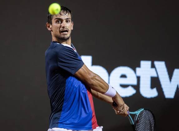 (240224) -- RIO DE JANEIRO, Feb. 24, 2024 -- Mariano Navone of Argentina hits a return during the quarterfinal against Joao Fonseca of Brazil at the 2024 ATP500 Rio Open at Jockey Club Brasileiro in Rio de Janeiro, Brazil, Feb. 23, 2024. ) (SP)BRAZIL-RIO DE JANEIRO-TENNIS-ATP500-RIO OPEN-QUARTERFINALS WangxTiancong 