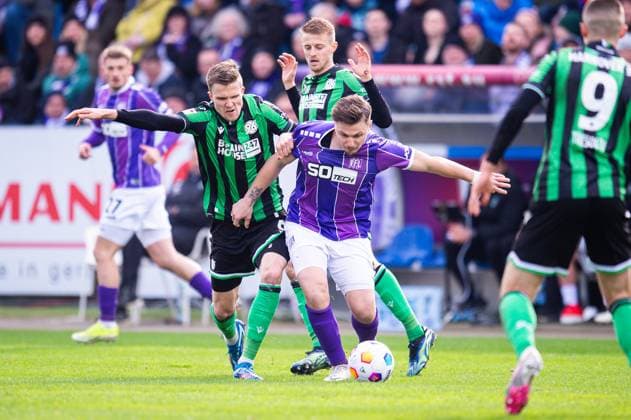 24 02 2024 Soccer, 2023 2024, 2 Bundesliga, Matchday 23, VfL Osnabrück Hannover 96 L R Fabian Kunze Hannover , Sebastian Ernst Hannover , Erik Engelhardt Osnabrück DFL REGULATIONS PROHIBIT ANY USE OF PHOTOGRAPHS AS IMAGE SEQUENCES AND OR QUASI VIDEO
