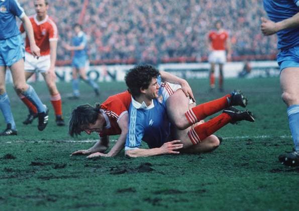 Nicky Reid (City) tangles with Stan Bowles (Forest) Nottingham Forest v Manchester City 23 02 1980 