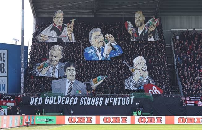 25 02 2024 Soccer Season 2023 2024 2 Soccer Bundesliga 23 Matchday SpVgg Greuther Fürth Kleeblatt 1 FC Nürnberg FCN Club Derby Frankenderby Sportfoto Zink DaMa xdaxmax DFL regulations prohibit any use of photographs as image sequences and or quasi video only for editorial use Choreography of the Clubfan Clubfans FCN Fans Fans Fans before the start of the match against the investors of the DFL