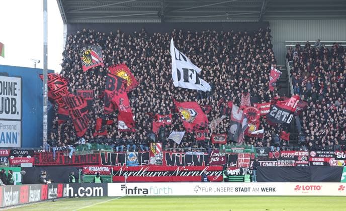 25 02 2024 Soccer Season 2023 2024 2 Soccer Bundesliga 23 Matchday SpVgg Greuther Fürth Kleeblatt 1 FC Nürnberg FCN Club Derby Frankenderby Sportfoto Zink DaMa xdaxmax DFL regulations prohibit any use of photographs as image sequences and or quasi video only for editorial use Clubfan Clubfans FCN Fans Fans Fans in the guest block with waving flags