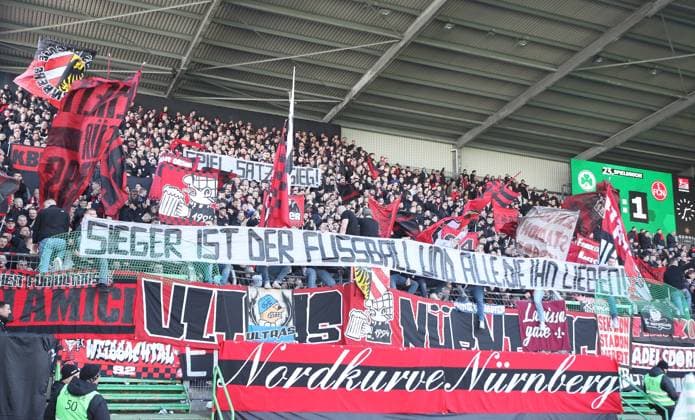 25 02 2024 Soccer Season 2023 2024 2 Soccer Bundesliga 23 Matchday SpVgg Greuther Fürth Kleeblatt 1 FC Nürnberg FCN Club Derby Frankenderby Sportfoto Zink DaMa xdaxmax DFL regulations prohibit any use of photographs as image sequences and or quasi video only for editorial use Banner Banner of Clubfan Clubfans FCN Fans Fans Spiel Satz und Sieg Sieger ist der Fußball und alle, die ihn lieben