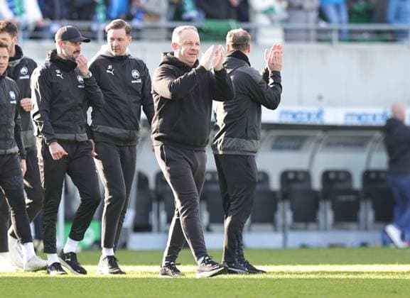 25 02 2024 Soccer Season 2023 2024 2 Soccer Bundesliga 23 Matchday SpVgg Greuther Fürth Kleeblatt 1 FC Nürnberg FCN Club Derby Frankenderby Sportfoto Zink DaMa xdaxmax DFL regulations prohibit any use of photographs as image sequences and or quasi video only for editorial use joy jubilation after end of match team team of SpVgg Greuther Fürth celebration Alexander Zorniger coach SpVgg Greuther Fürth and coaching team applauds hands spectators audience fans too