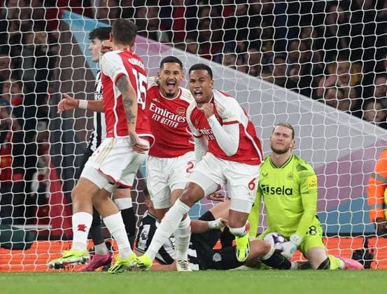 London, England, 24th February 2024. Loris Karius of Newcastle United looks on as Gabriel of Arsenal celebrates his sides opening goal during the Premier League match at the Emirates Stadium, London. Picture credit should read: David Klein Sportimage EDITORIAL USE ONLY. No use with unauthorised audio, video, data, fixture lists, club league logos or live services. Online in-match use limited to 120 images, no video emulation. No use in betting, games or single club league player publications. SPI-2961-0015
