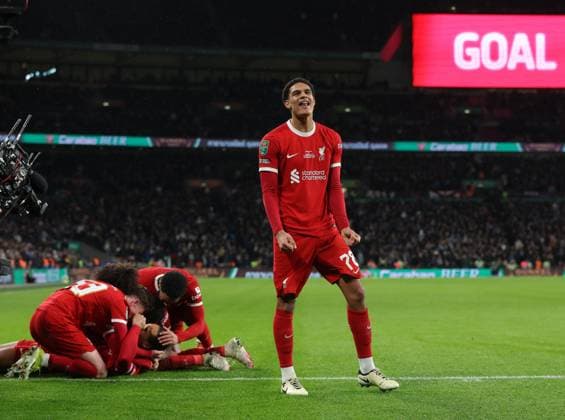 London, England, 25th February 2024. Jarell Quansah of Liverpool celebrated after Virgil van Dijk of Liverpool scores the opening goal during the Carabao Cup match at Wembley Stadium, London. Picture credit should read: Paul Terry Sportimage EDITORIAL USE ONLY. No use with unauthorised audio, video, data, fixture lists, club league logos or live services. Online in-match use limited to 120 images, no video emulation. No use in betting, games or single club league player publications. SPI-2963-0055