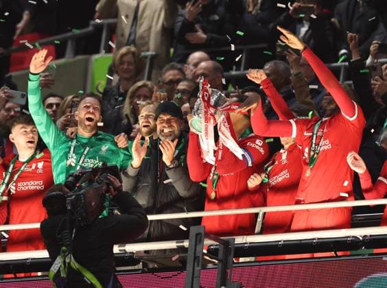 London, England, 25th February 2024. Jurgen Klopp, Manager of Liverpool and Virgil van Dijk of Liverpool lift the trophy after the Carabao Cup match at Wembley Stadium, London. Picture credit should read: Paul Terry Sportimage EDITORIAL USE ONLY. No use with unauthorised audio, video, data, fixture lists, club league logos or live services. Online in-match use limited to 120 images, no video emulation. No use in betting, games or single club league player publications. SPI-2963-0113