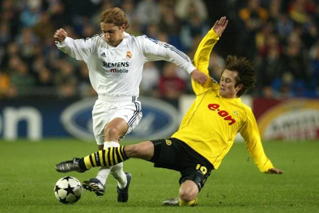 Onderwerp Subject: Real Madrid - Borussia Dortmund (2-1) Champions League Reklame: Club Team Country: Real Madrid Bosrussia Dortmund Seizoen Season: 2002 2003 FOTO PHOTO: Real Madrid s michel SALGADO (L) in duel with Borussia Dortmund s Tomas ROSICKY (R) MADRID ESP Content not available for redistribution in The Netherlands directly or indirectly through any third parties. Copyright: xBSRxAgencyx 03190219362C6928