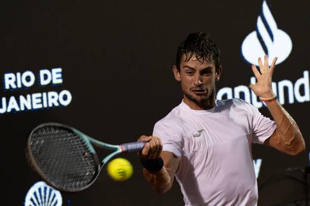 (240226) -- RIO DE JANEIRO, Feb. 26, 2024 -- Mariano Navone of Argentina hits a return during the men s singles final between Sebastian Baez of Argentina and Mariano Navone of Argentina at the 2024 ATP500 Rio Open at Jockey Club Brasileiro in Rio de Janeiro, Brazil, Feb. 25, 2024. ) (SP)BRAZIL-RIO DE JANEIRO-TENNIS-RIO OPEN-MEN S SINGLES-FINAL WangxTiancong 
