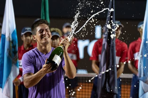 (240226) -- RIO DE JANEIRO, Feb. 26, 2024 -- Sebastian Baez of Argentina celebrates with champagne during the awarding ceremony after the men s singles final between Sebastian Baez of Argentina and Mariano Navone of Argentina at the 2024 ATP500 Rio Open at Jockey Club Brasileiro in Rio de Janeiro, Brazil, Feb. 25, 2024. ) (SP)BRAZIL-RIO DE JANEIRO-TENNIS-RIO OPEN-MEN S SINGLES-FINAL WangxTiancong 