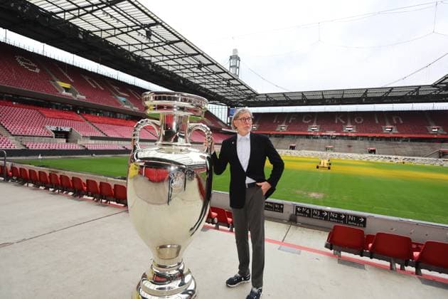 Fifa Euro 24, Countdown 111 days to kick-off Cologne is in European Championship fever, Toni Schumacher with oversized replica of the European Championship trophy in the RheinEnergiestadion, 26 02 2024, picture