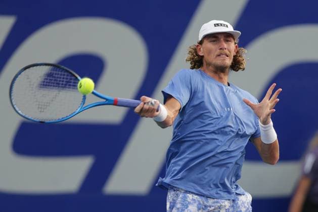 (240228) -- ACAPULCO, Feb. 28, 2024 -- Max Purcell of Australia hits a return during the men s singles first round match between Max Purcell of Australia and Frances Tiafoe of the United States at the 2024 ATP, Tennis Herren Mexican Open tennis tournament in Acapulco, Mexico, Feb. 27, 2024. (Photo by Xinhua) (SP)MEXICO-ACAPULCO-TENNIS-ATP-MEXICAN OPEN FranciscoxCanedo 