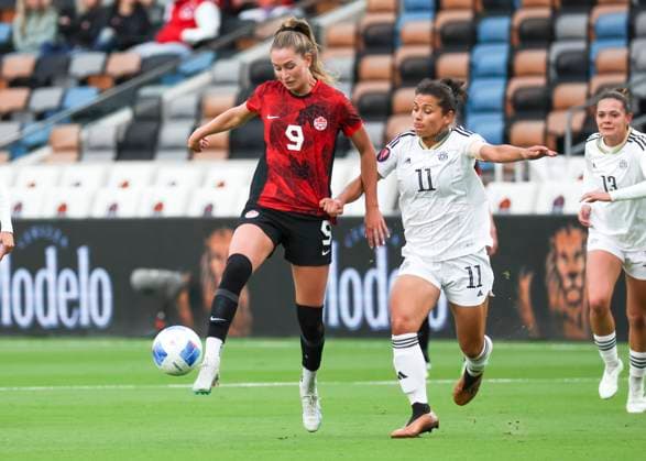 HOUSTON, TX - FEBRUARY 28: Canada forward Jordyn Huitema (9) keeps the bal away from Costa Rica midfielder Raquel Rodriguez (11) in the first half during the CONCACAF Womens Gold Cup Group C - Canada vs Costa Rica on February 28, 2024 at Shell Energy Stadium in Houston, Texas. (Photo by Leslie Plaza Johnson Icon Sportswire) SOCCER: FEB 28 CONCACAF Womens Gold Cup Group C - Canada vs Costa Rica EDITORIAL USE ONLY Icon240228007
