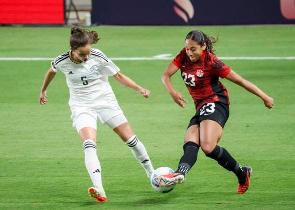 HOUSTON, TX - FEBRUARY 28: Costa Rica defender Valeria Del Campo (5) and Canada forward Olivia Smith (23) fight for ball in the second half during the CONCACAF Womens Gold Cup Group C - Canada vs Costa Rica on February 28, 2024 at Shell Energy Stadium in Houston, Texas. (Photo by Leslie Plaza Johnson Icon Sportswire) SOCCER: FEB 28 CONCACAF Womens Gold Cup Group C - Canada vs Costa Rica EDITORIAL USE ONLY Icon240228031