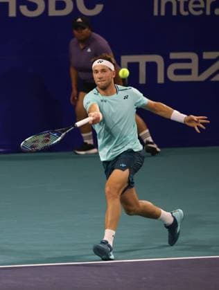 (240229) -- ACAPULCO, Feb. 29, 2024 -- Casper Ruud of Norway hits a return during the men s singles second round match against Dusan Lajovic of Serbia at the 2024 ATP, Tennis Herren Mexican Open tennis tournament in Acapulco, Mexico, Feb. 28, 2024. ) (SP)MEXICO-ACAPULCO-TENNIS-ATP-MEXICAN OPEN LixMengxin 