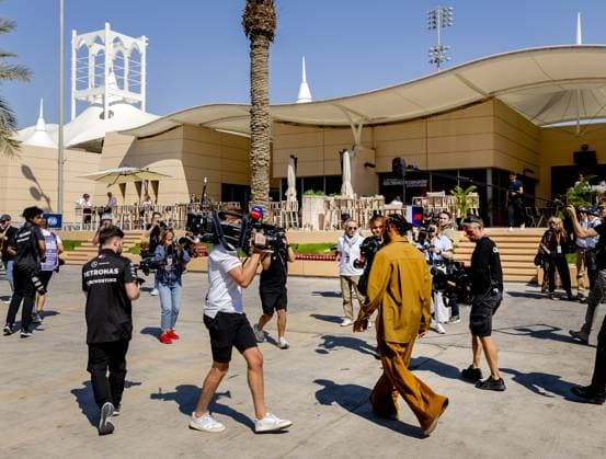 BAHRAIN - Lewis Hamilton (Mercedes) in the paddock prior to the third free practice at the Bahrain International Circuit in the Sakhir desert area prior to the Bahrain Grand Prix. ANP REMKO DE WAAL Practice 2024 2025 xVIxANPxSportx xxANPxIVx 492524893 originalFilename: 492524893.jpg