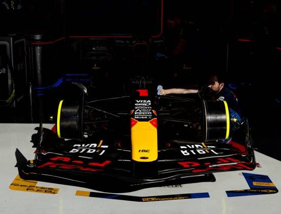 BAHRAIN - Mechanics at the car of Max Verstappen (Red Bull Racing) during the third free practice at the Bahrain International Circuit in the Sakhir desert area prior to the Bahrain Grand Prix. ANP REMKO DE WAAL Practice 2024 2025 xVIxANPxSportx xxANPxIVx 492524896 originalFilename: 492524896.jpg
