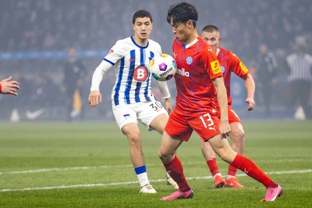 Berlin, 01 03 2024, Soccer, 2 Bundesliga, Matchday 24, Hertha BSC Holstein Kiel, Olympiastadion Berlins Ibrahim Maza l fights against Shuto Machino of Holstein Kiel for the ball DFL regulations and DFB regulations prohibit any use of photographs as image sequences and or quasi video, Foto Andreas Gora Hertha BSC Holstein Kiel