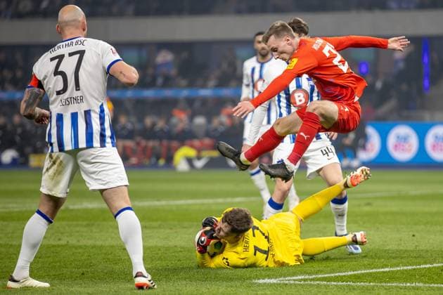 Berlin, 01 03 2024, Soccer, 2 Bundesliga, Matchday 24, Hertha BSC Holstein Kiel, Olympiastadion Berlins goalkeeper Tjark Ernst parries a ball DFL regulations and DFB regulations prohibit any use of photographs as image sequences and or quasi video, Foto Andreas Gora Hertha BSC Holstein Kiel