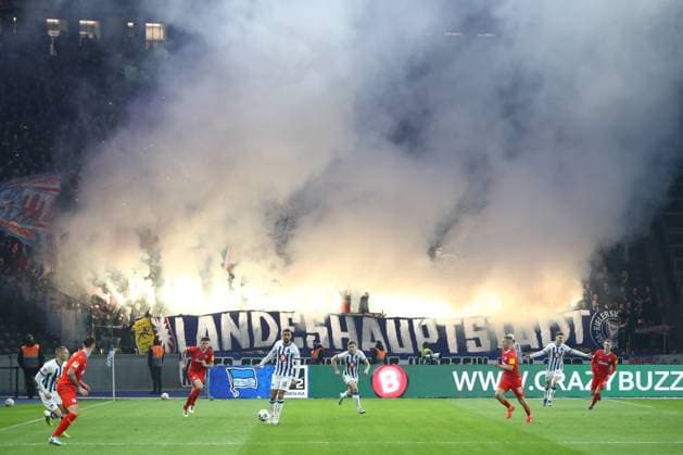 01 03 2024, xtgx, Soccer 2 Bundesliga, Hertha BSC Berlin Holstein Kiel emspor, v l symbol photo, symbol image, fans of Kiel zuenden Pyro, pyrotechnics, smoke, fog DFL DFB REGULATIONS PROHIBIT ANY USE OF PHOTOGRAPHS as IMAGE SEQUENCES and or QUASI VIDEO Berlin