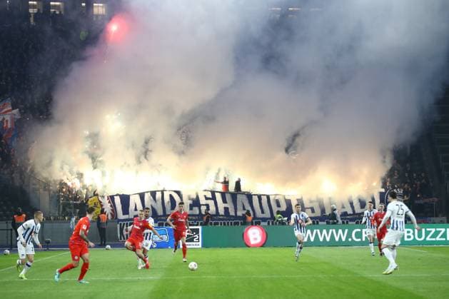 01 03 2024, xtgx, Soccer 2 Bundesliga, Hertha BSC Berlin Holstein Kiel emspor, v l symbol photo, symbol image, fans of Kiel zuenden Pyro, pyrotechnics, smoke, fog DFL DFB REGULATIONS PROHIBIT ANY USE OF PHOTOGRAPHS as IMAGE SEQUENCES and or QUASI VIDEO Berlin