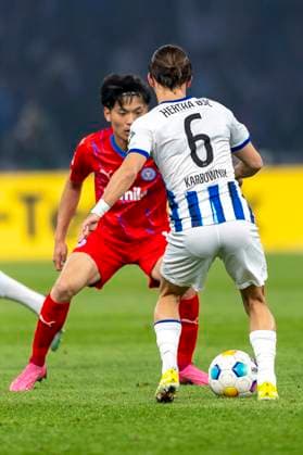 Duel between Shuto Machino Holstein Kiel, 13 and Michal Karbownik Hertha BSC Berlin, 06 Soccer 2 Bundesliga, Season 2023 2024, Matchday 24, Hertha BSC Holstein Kiel on 01 03 2024 at the Olympiastadion in Berlin Important notice According to the regulations of the DFL Deutsche Fussball Liga and the DFB Deutscher Fussball Bund it is prohibited, to utilize or have utilized photographs taken in the stadium and or of the match in the form of sequential images and or video-like photo series Foto Kirchner Media TH Copyright: xKirchner-Media THx