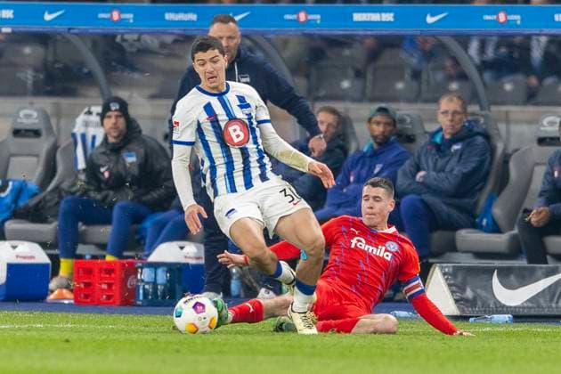 Foul by Philipp Sander Holstein Kiel, 16 on Ibrahim Maza Hertha BSC Berlin, 30 Soccer 2 Bundesliga, Season 2023 2024, Matchday 24, Hertha BSC Holstein Kiel on 01 03 2024 at the Olympiastadion in Berlin Important notice According to the regulations of the DFL German Football League and the DFB German Football Association, it is prohibited, to utilize or have utilized photographs taken in the stadium and or of the match in the form of sequential images and or video-like photo series Foto Kirchner Media TH Copyright: xKirchner-Media THx