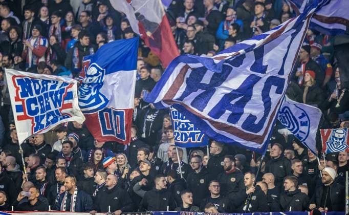 Berlin, 01 03 2024, Soccer, 2 Bundesliga, Matchday 24, Hertha BSC Holstein Kiel, Olympiastadion Fans of Holstein Kiel stand in the stadiums guest block DFL regulations and DFB regulations prohibit any use of photographs as image sequences and or quasi video, Foto Andreas Gora Hertha BSC Holstein Kiel
