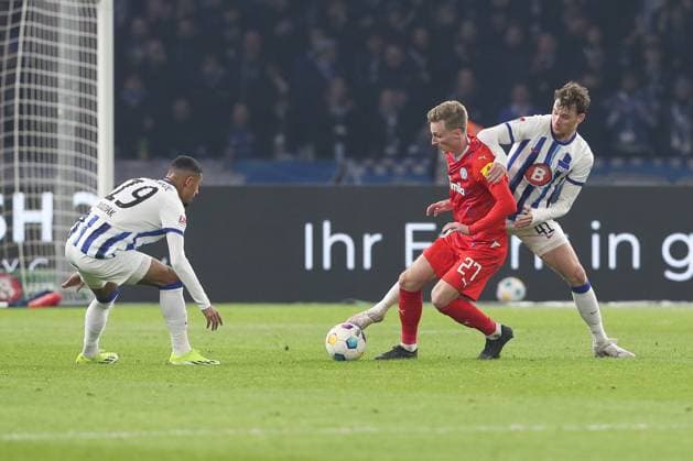 01 03 2024, xtgx, Soccer 2 Bundesliga, Hertha BSC Berlin Holstein Kiel emspor, v l Jeremy Dudziak Hertha, 19 , Finn Porath Kiel, 27 , Pascal Klemens Hertha, 41 duel, fight, tackle DFL DFB REGULATIONS PROHIBIT ANY USE OF PHOTOGRAPHS as IMAGE SEQUENCES and or QUASI VIDEO Berlin