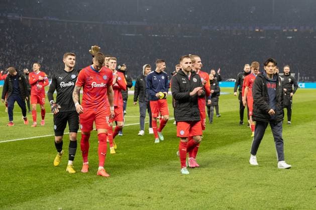 01 03 2024, xtgx, Soccer 2 Bundesliga, Hertha BSC Holstein Kiel emspor, v l Kiels players thank the fans DFL DFB REGULATIONS PROHIBIT ANY USE OF PHOTOGRAPHS as IMAGE SEQUENCES and or QUASI VIDEO Berlin
