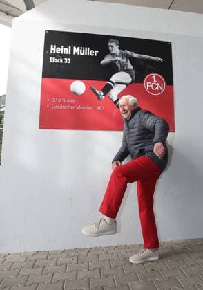 02 03 2024 Soccer Season 2023 2024 2 Soccer Bundesliga 24 Matchday 1 FC Nürnberg FCN Club BTSV Eintracht Braunschweig EBS Sportfoto Zink DaMa xdaxmax DFL regulations prohibit any use of photographs as image sequences and or quasi video only for editorial use Heini Müller ehem FCN Meisterspieler Meister von 1961 wird zu seinem 90sten Geburtstag geehrt Der Block Fanblock 33 erhält seinen Namen Sign Block 33 Heini Müller Heini Müller mimics the shooting position as shown on the sign