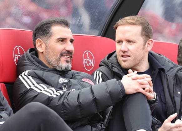02 03 2024 Soccer Season 2023 2024 2 Soccer Bundesliga 24 Matchday 1 FC Nürnberg FCN Club BTSV Eintracht Braunschweig EBS Sportfoto Zink DaMa xdaxmax DFL regulations prohibit any use of photographs as image sequences and or quasi video only for editorial use Cristian Fiel Trainer 1 FC Nürnberg FCN Olaf Rebbe Sport Director 1 FC Nürnberg FCN have a chat