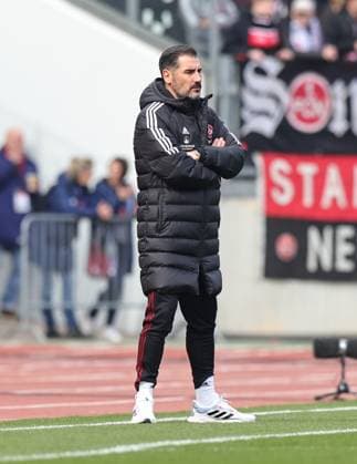 02 03 2024 Soccer Season 2023 2024 2 Soccer Bundesliga 24 Matchday 1 FC Nürnberg FCN Club BTSV Eintracht Braunschweig EBS Sportfoto Zink DaMa xdaxmax DFL regulations prohibit any use of photographs as image sequences and or quasi video only for editorial use Cristian Fiel Trainer 1 FC Nürnberg FCN nachdenklich
