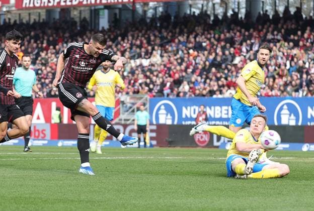 02 03 2024 Soccer Season 2023 2024 2 Soccer Bundesliga 24 Matchday 1 FC Nürnberg FCN Club BTSV Eintracht Braunschweig EBS Sportfoto Zink DaMa xdaxmax DFL regulations prohibit any use of photographs as image sequences and or quasi video only for editorial use Erik Wekesser 13, 1 FC Nürnberg FCN with shot on goal