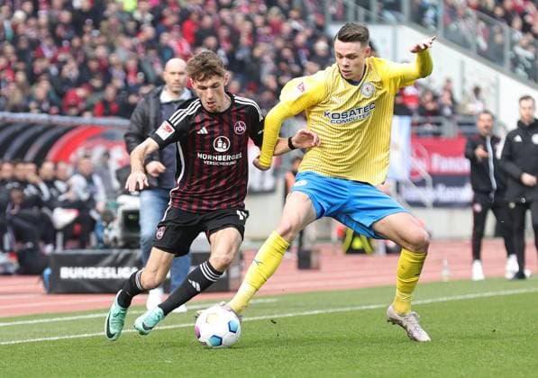 02 03 2024 Soccer Season 2023 2024 2 Soccer Bundesliga 24 Matchday 1 FC Nürnberg FCN Club BTSV Eintracht Braunschweig EBS Sportfoto Zink DaMa xdaxmax DFL regulations prohibit any use of photographs as image sequences and or quasi video only for editorial use Benjamin Goller 14, 1 FC Nürnberg FCN Thorir Johann Helgason 20, Eintracht Braunschweig BTSV EBS
