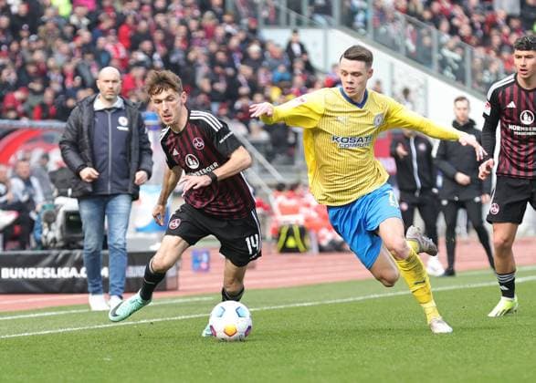 02 03 2024 Soccer Season 2023 2024 2 Soccer Bundesliga 24 Matchday 1 FC Nürnberg FCN Club BTSV Eintracht Braunschweig EBS Sportfoto Zink DaMa xdaxmax DFL regulations prohibit any use of photographs as image sequences and or quasi video only for editorial use Benjamin Goller 14, 1 FC Nürnberg FCN Thorir Johann Helgason 20, Eintracht Braunschweig BTSV EBS