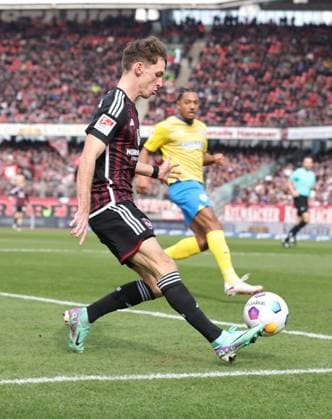 02 03 2024 Soccer Season 2023 2024 2 Soccer Bundesliga 24 Matchday 1 FC Nürnberg FCN Club BTSV Eintracht Braunschweig EBS Sportfoto Zink DaMa xdaxmax DFL regulations prohibit any use of photographs as image sequences and or quasi video only for editorial use Benjamin Goller 14, 1 FC Nürnberg FCN flankt Flanke