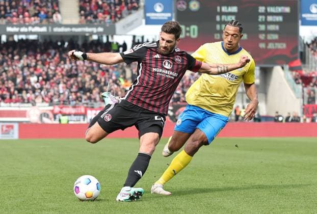 02 03 2024 Soccer Season 2023 2024 2 Soccer Bundesliga 24 Matchday 1 FC Nürnberg FCN Club BTSV Eintracht Braunschweig EBS Sportfoto Zink DaMa xdaxmax DFL regulations prohibit any use of photographs as image sequences and or quasi video only for editorial use Enrico Valentini 22, 1 FC Nürnberg FCN Anton Leander Donkor 19, Eintracht Braunschweig BTSV EBS