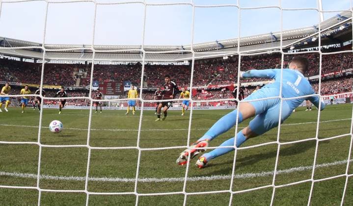 02 03 2024 Soccer Season 2023 2024 2 Soccer Bundesliga 24 Matchday 1 FC Nürnberg FCN Club BTSV Eintracht Braunschweig EBS Sportfoto Zink DaMa xdaxmax DFL regulations prohibit any use of photographs as image sequences and or quasi video only for editorial use Goal Goal Shot to 2 0 Goalscorer Can Yilmaz Uzun 42, 1 FC Nürnberg FCN vs Ron Thorben Hoffmann 1, Eintracht Braunschweig BTSV EBS by penalty kick