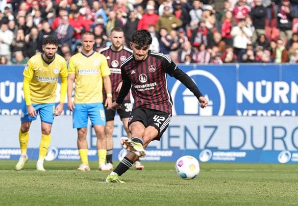 02 03 2024 Soccer Season 2023 2024 2 Soccer Bundesliga 24 Matchday 1 FC Nürnberg FCN Club BTSV Eintracht Braunschweig EBS Sportfoto Zink DaMa xdaxmax DFL regulations prohibit any use of photographs as image sequences and or quasi video only for editorial use Goal Goal Shot Goal Shooter 2 0 Goal Scorer Can Yilmaz Uzun 42, 1 FC Nürnberg FCN by penalty kick