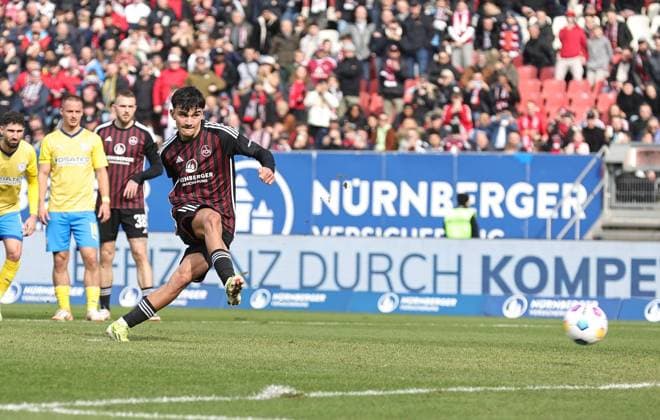 02 03 2024 Soccer Season 2023 2024 2 Soccer Bundesliga 24 Matchday 1 FC Nürnberg FCN Club BTSV Eintracht Braunschweig EBS Sportfoto Zink DaMa xdaxmax DFL regulations prohibit any use of photographs as image sequences and or quasi video only for editorial use Goal Goal Shot Goal Shooter 2 0 Goal Scorer Can Yilmaz Uzun 42, 1 FC Nürnberg FCN by penalty kick