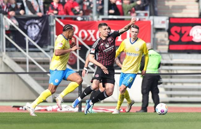 02 03 2024 Soccer Season 2023 2024 2 Soccer Bundesliga 24 Matchday 1 FC Nürnberg FCN Club BTSV Eintracht Braunschweig EBS Sportfoto Zink DaMa xdaxmax DFL regulations prohibit any use of photographs as image sequences and or quasi video only for editorial use Anton Leander Donkor 19, Eintracht Braunschweig BTSV EBS Erik Wekesser 13, 1 FC Nürnberg FCN